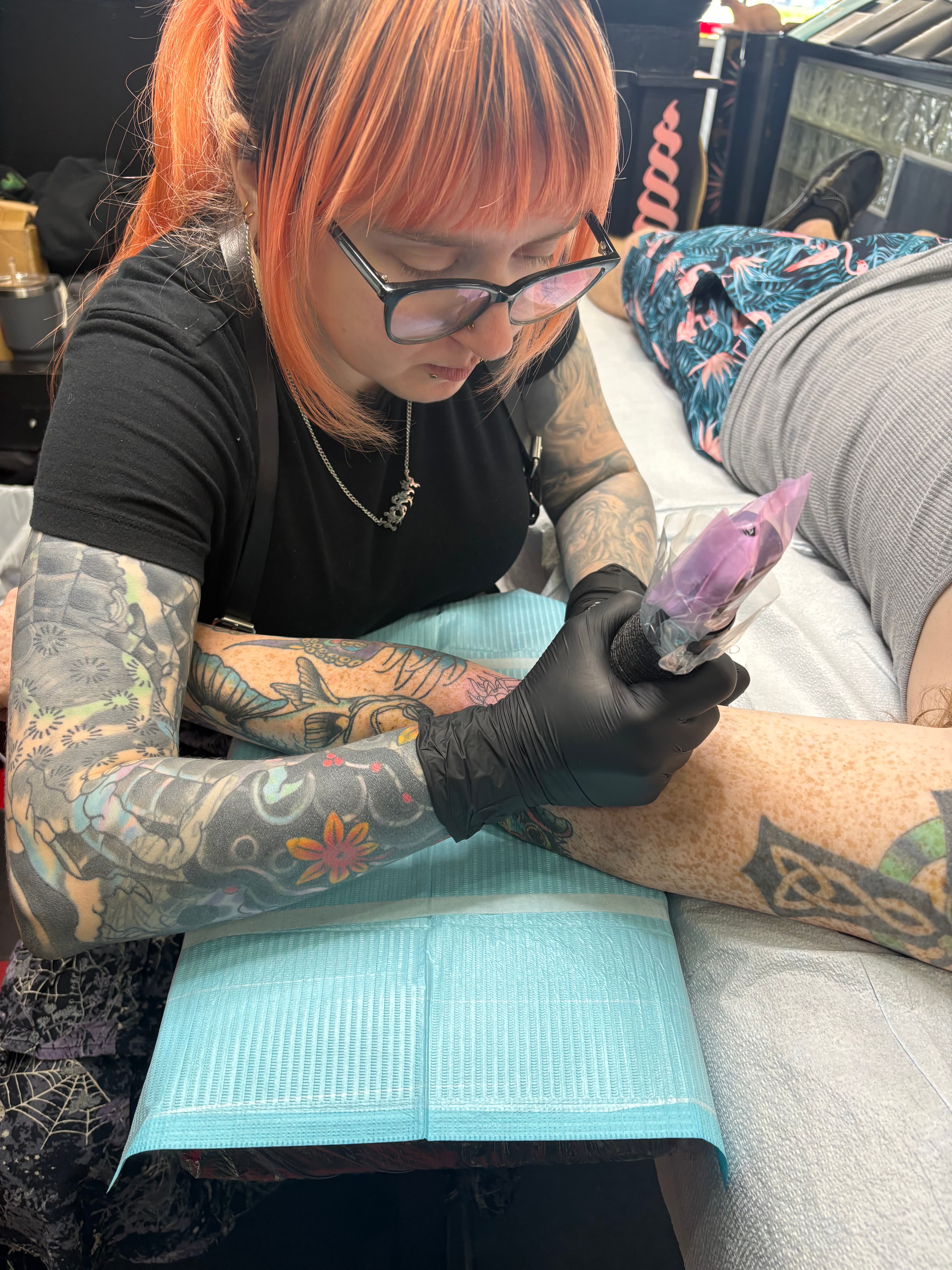 Frye tattooing a client